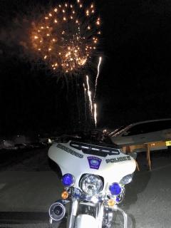 Motercycle next to Fireworks